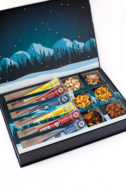 Gourmet advent calendar with savory meat sticks and nut medley in a holiday-themed gift box.