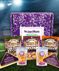 Game Day Snack Box with cheese, pretzel nuggets, and gourmet nuts against a sports stadium backdrop.