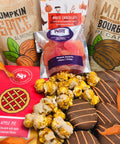 Autumn Assortment Box featuring Pumpkin Spice Almonds, Maple Bourbon Pecans, Apple Pie Chocolate, and fall-themed gourmet treats.