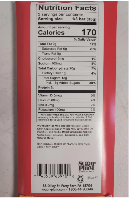 Nutrition facts label of Sugar Plum chocolate bar, showing calories and ingredients like milk chocolate, apple pieces, and spices.